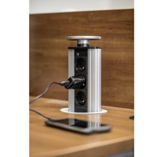 Pull-out desk outlet fi 100-3BS-Wherever there is no need to calculate every inch of space, a slightly larger version with a diameter of 100 mm can be used. When pulled out, three power sockets are available. Finished with a stylish cover. Available in two universal colours: black and silver.